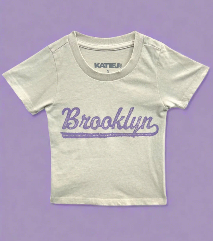 Katie J NYC  Girls Tween Brooklyn Graphic “BABY” Tee
